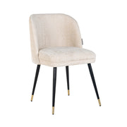 Contemporary dining chair in cream upholstery with black and gold legs