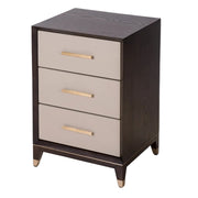 Dark wood bedside cabinet with three drawers and gold handles