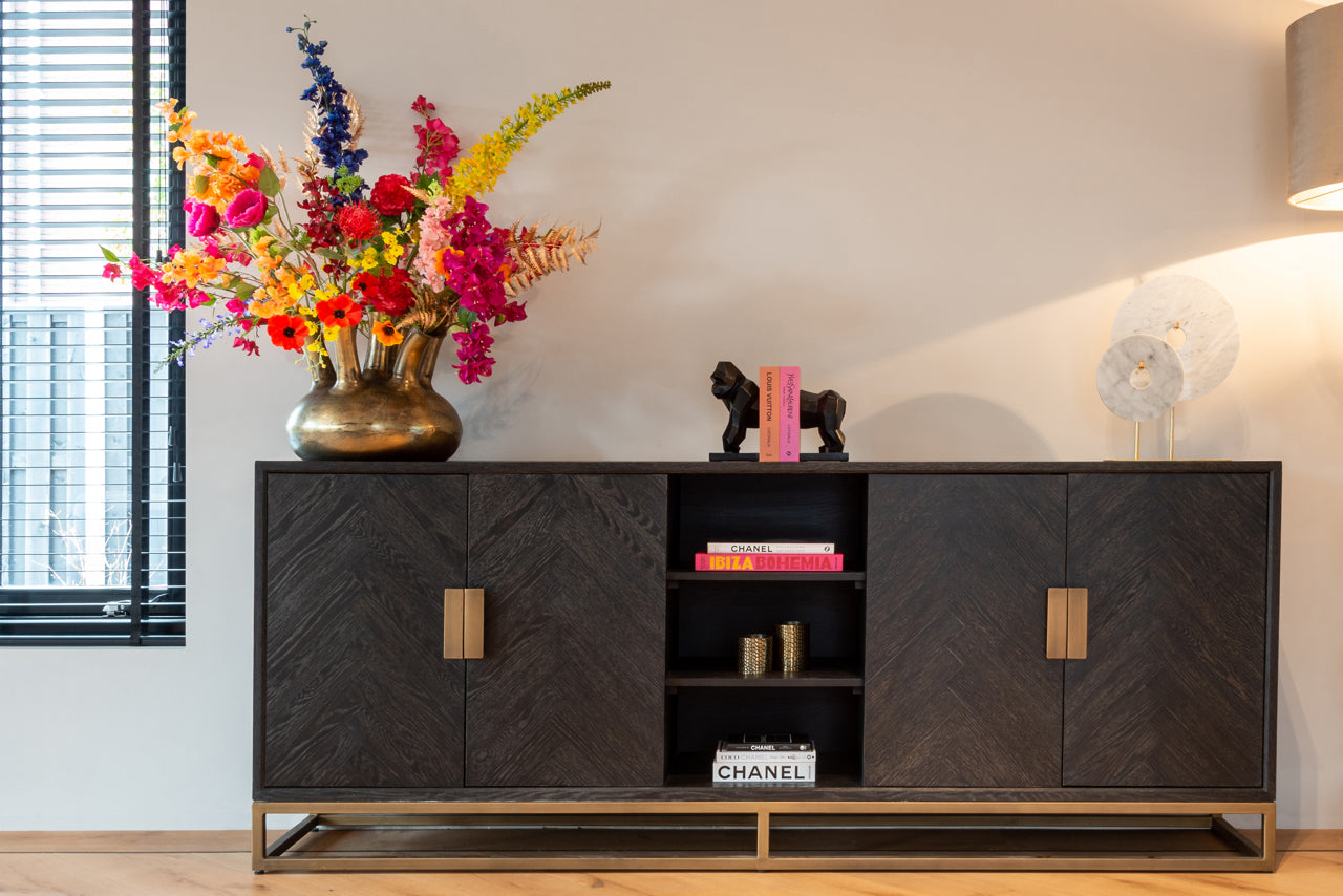 Modern black wood sideboard cabinet with brass handles and storage shelves.