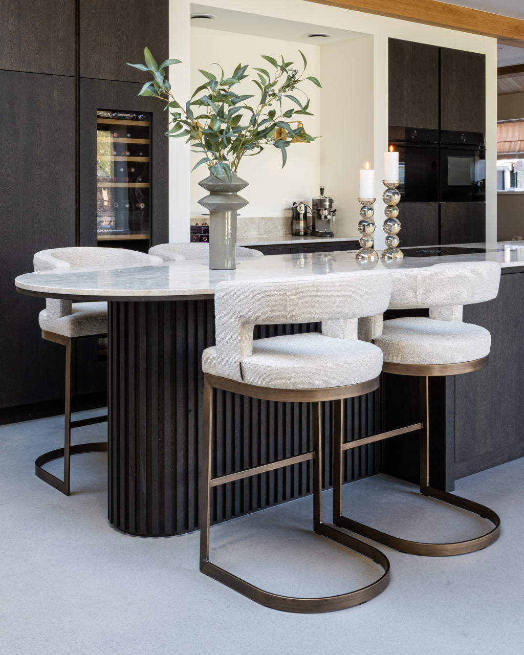 Modern bar stool with biscotti upholstery  and bronze metal