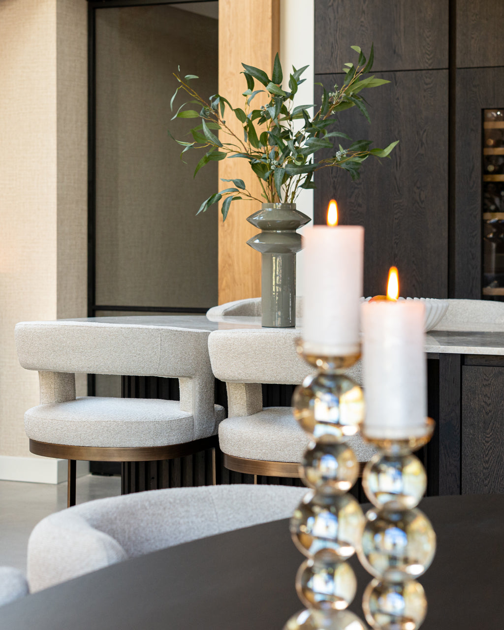 Modern bar stool with biscotti upholstery  and bronze metal