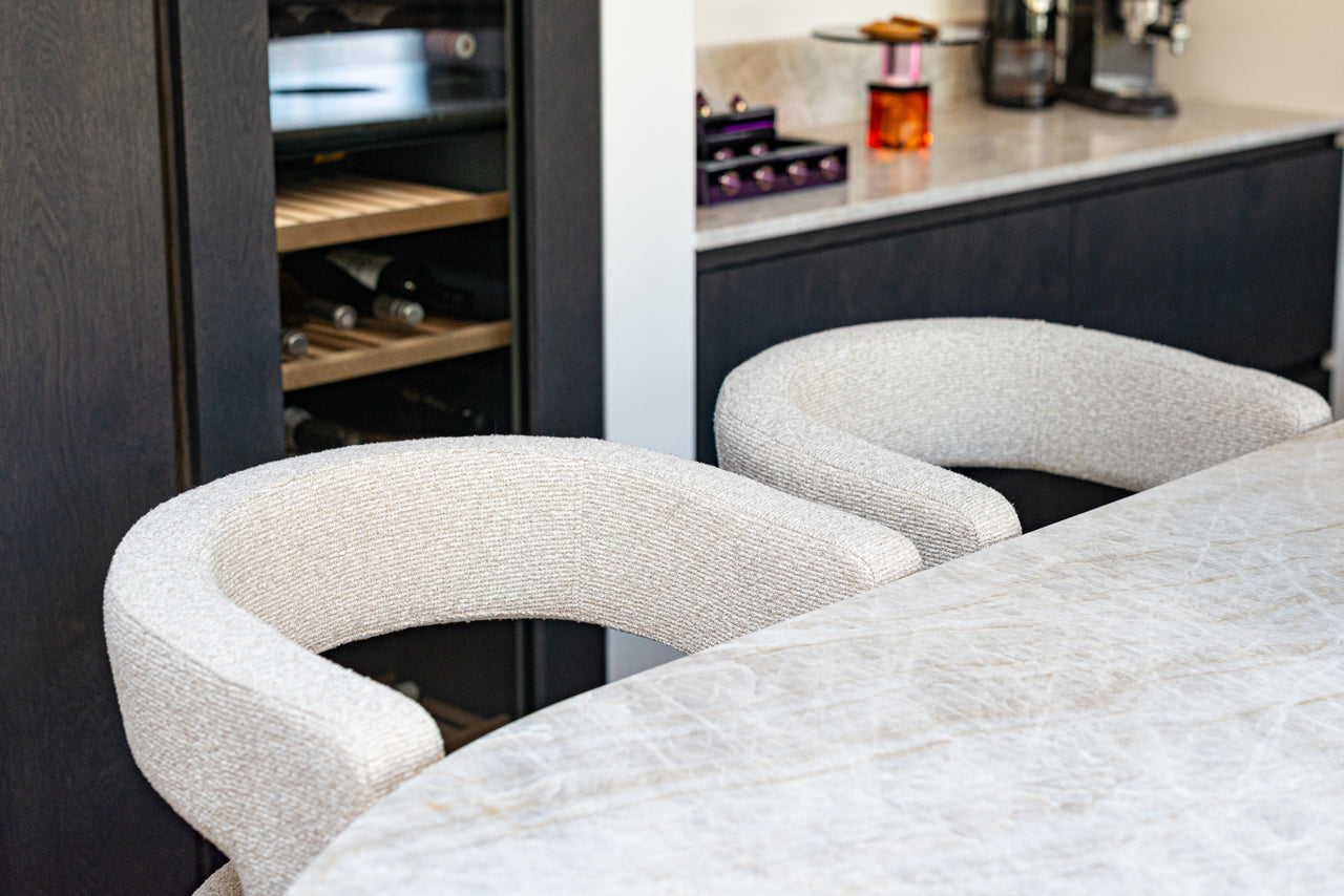 Modern bar stool with biscotti upholstery  and bronze metal