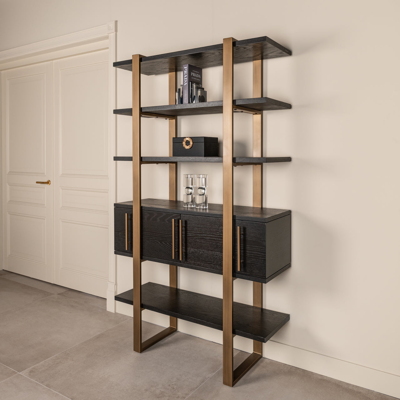 dark coffee wood with brass accents and open display shelves