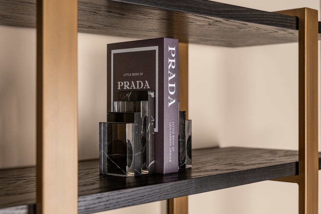 dark coffee wood with brass accents and open display shelves