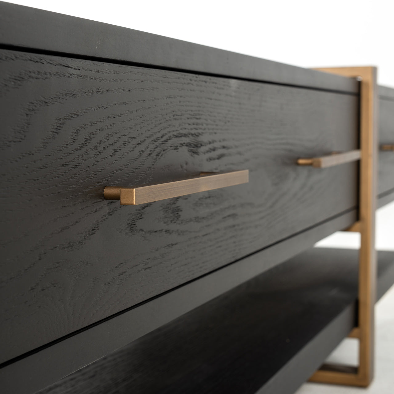 Dark wood and gold media unit with storage drawers 