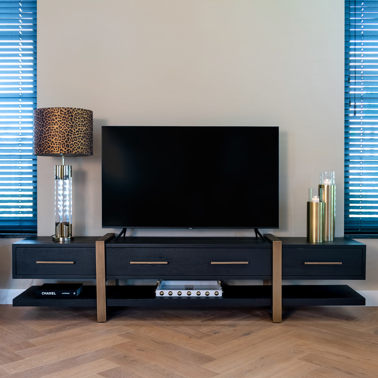Dark wood and gold media unit with storage drawers 