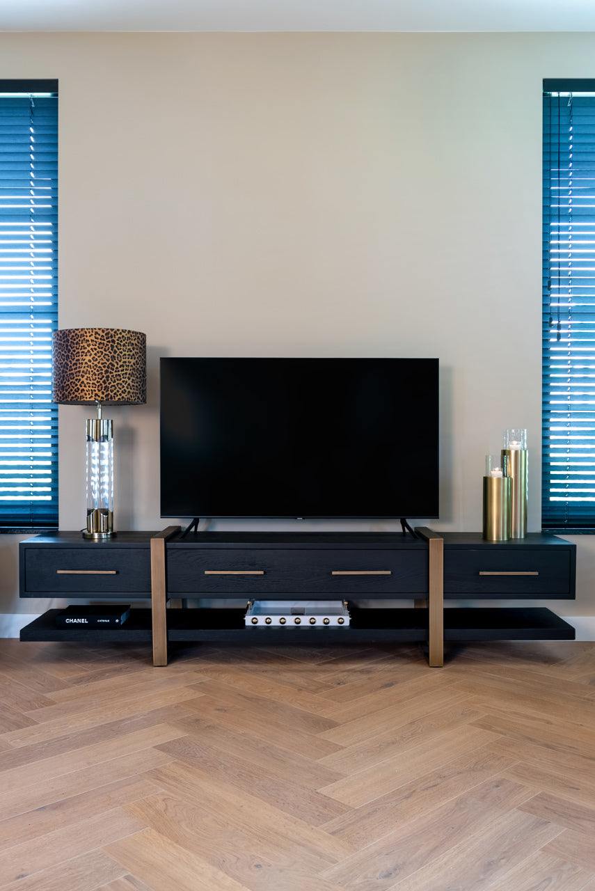Dark wood and gold media unit with storage drawers 