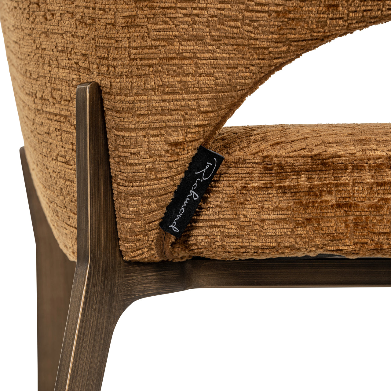 Rust upholstered dining chair with wraparound back and wooden legs