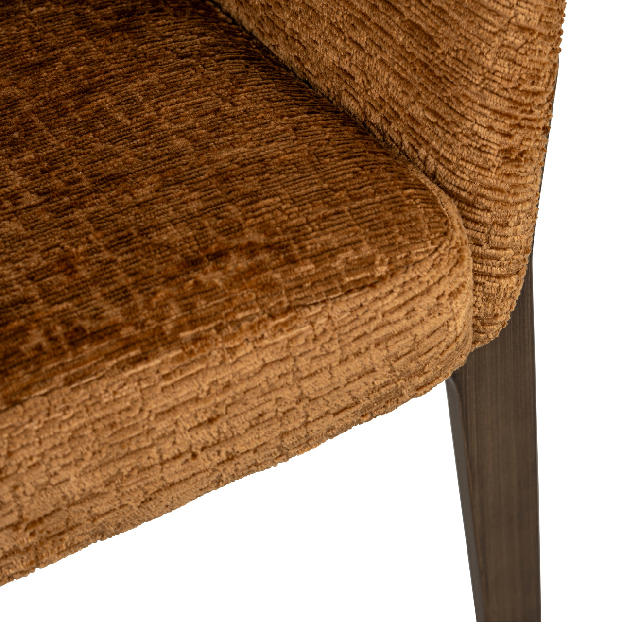 Rust upholstered dining chair with wraparound back and wooden legs