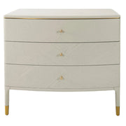 Off white three drawer chest with curved front and gold accents