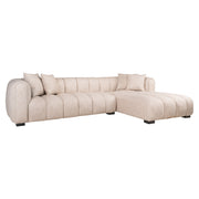 Extra-long beige luxury sofa with channel tufting