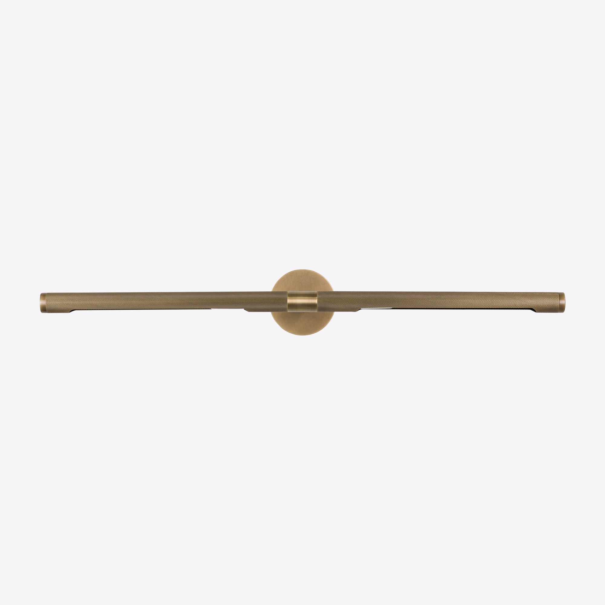 Modern brass LED picture light with slim horizontal bar for illuminating artwork or mirrors.