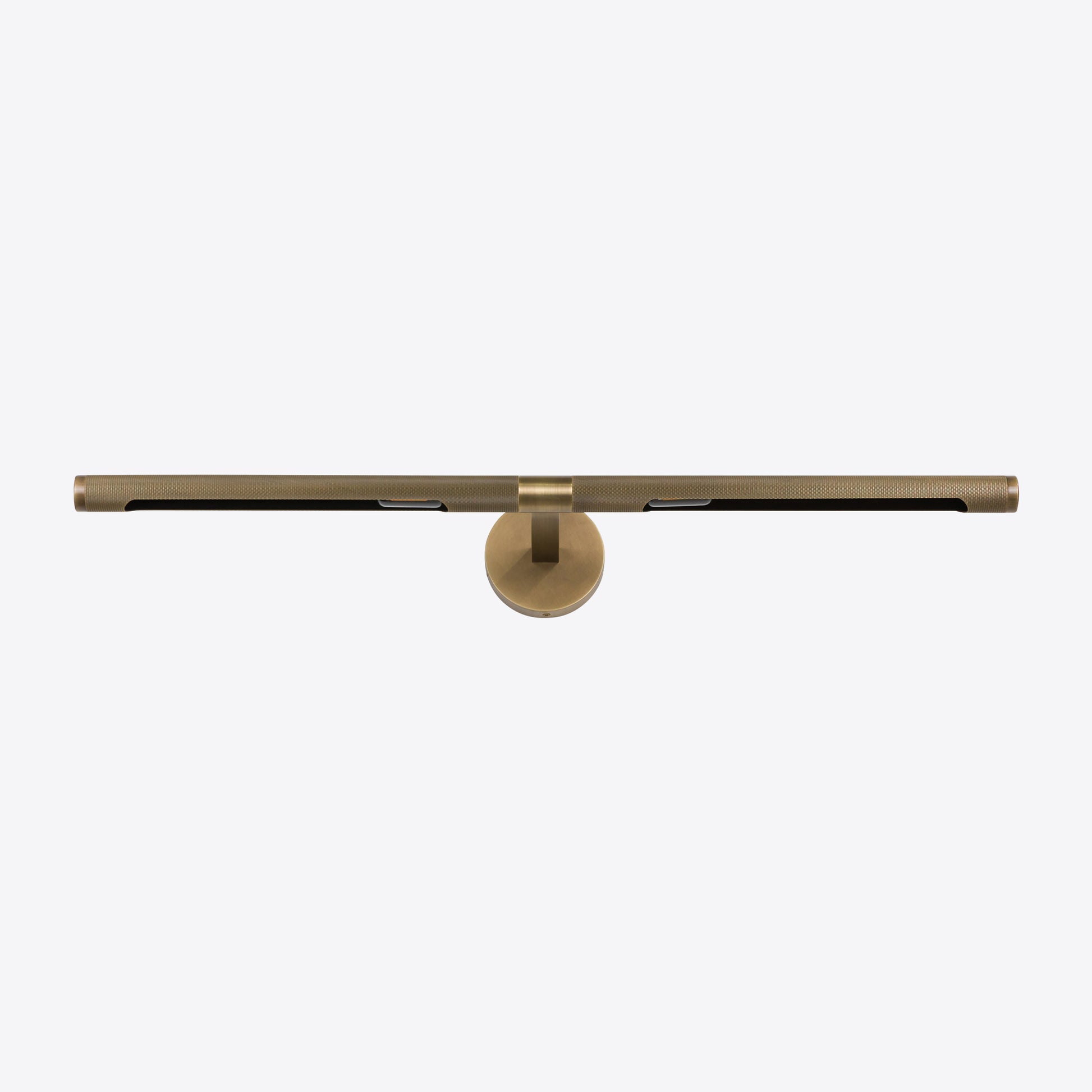 Modern brushed brass LED picture light with slim horizontal bar for illuminating artwork or mirrors.