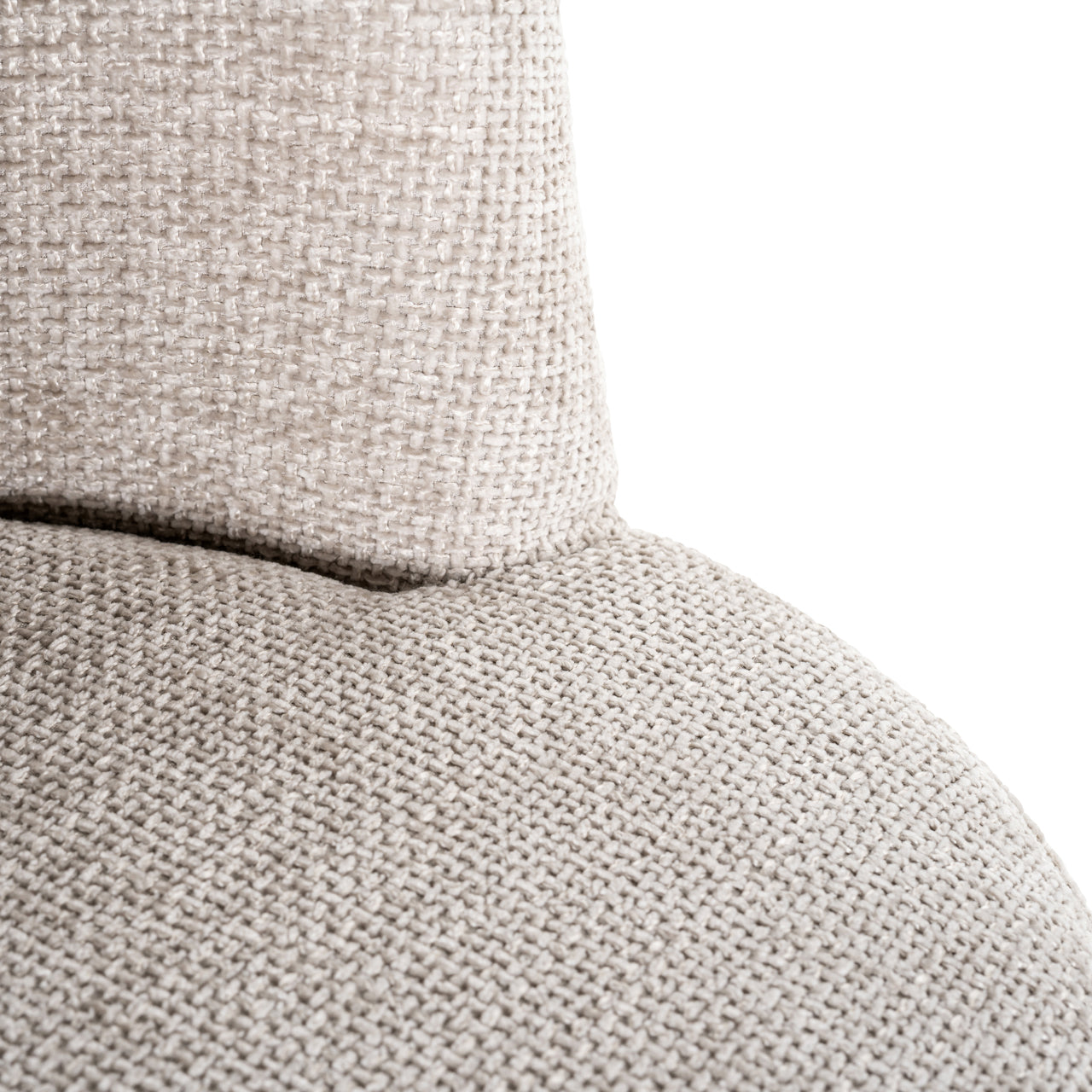 Contemporary upholstered dining chair in neutral fabric with black legs