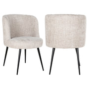 Contemporary upholstered dining chair in neutral fabric with black legs