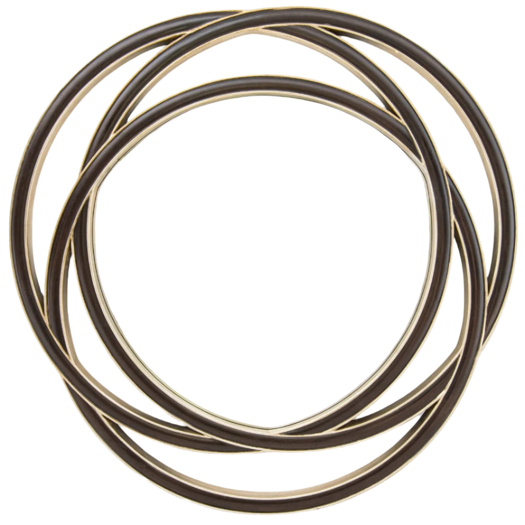 Luxury round walnut wall mirror with sculptural champagne silver frame design