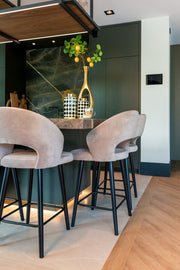 Modern khaki velvet bar stool with curved back and metal legs