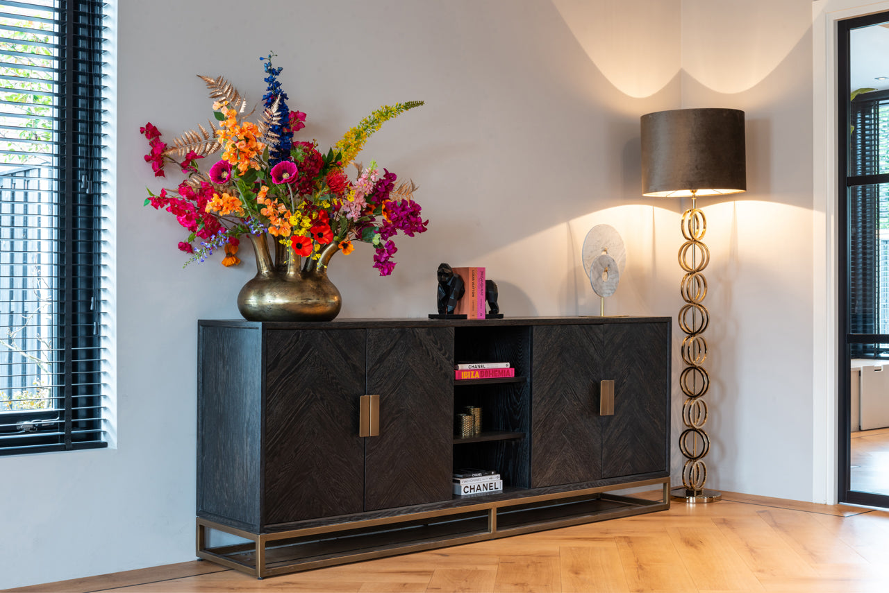 Modern black wood sideboard cabinet with brass handles and storage shelves.