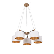 Modern five-light chandelier with white drum shades and gold interiors on a brushed brass frame.