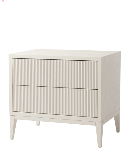 Wide white bedside table with ribbed drawer fronts