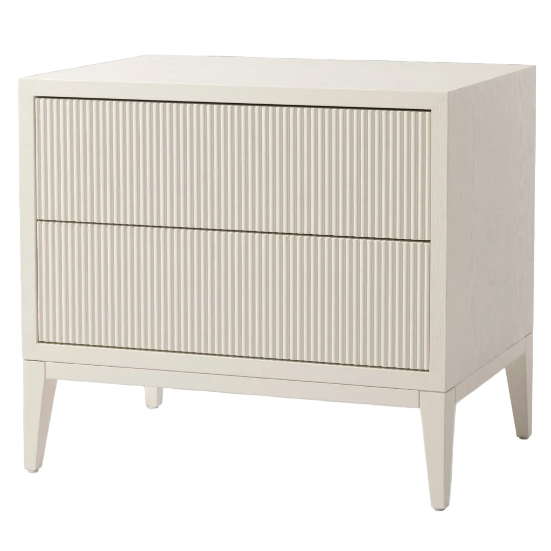 Wide grey bedside table with fluted drawer fronts and tapered legs