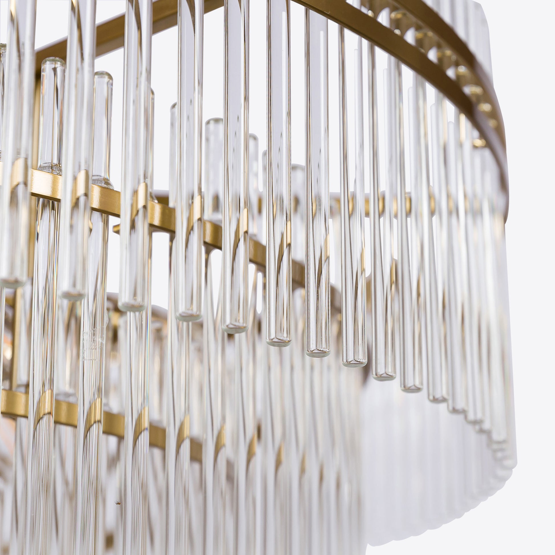 Tiered crystal glass chandelier with gold frame and chain suspension