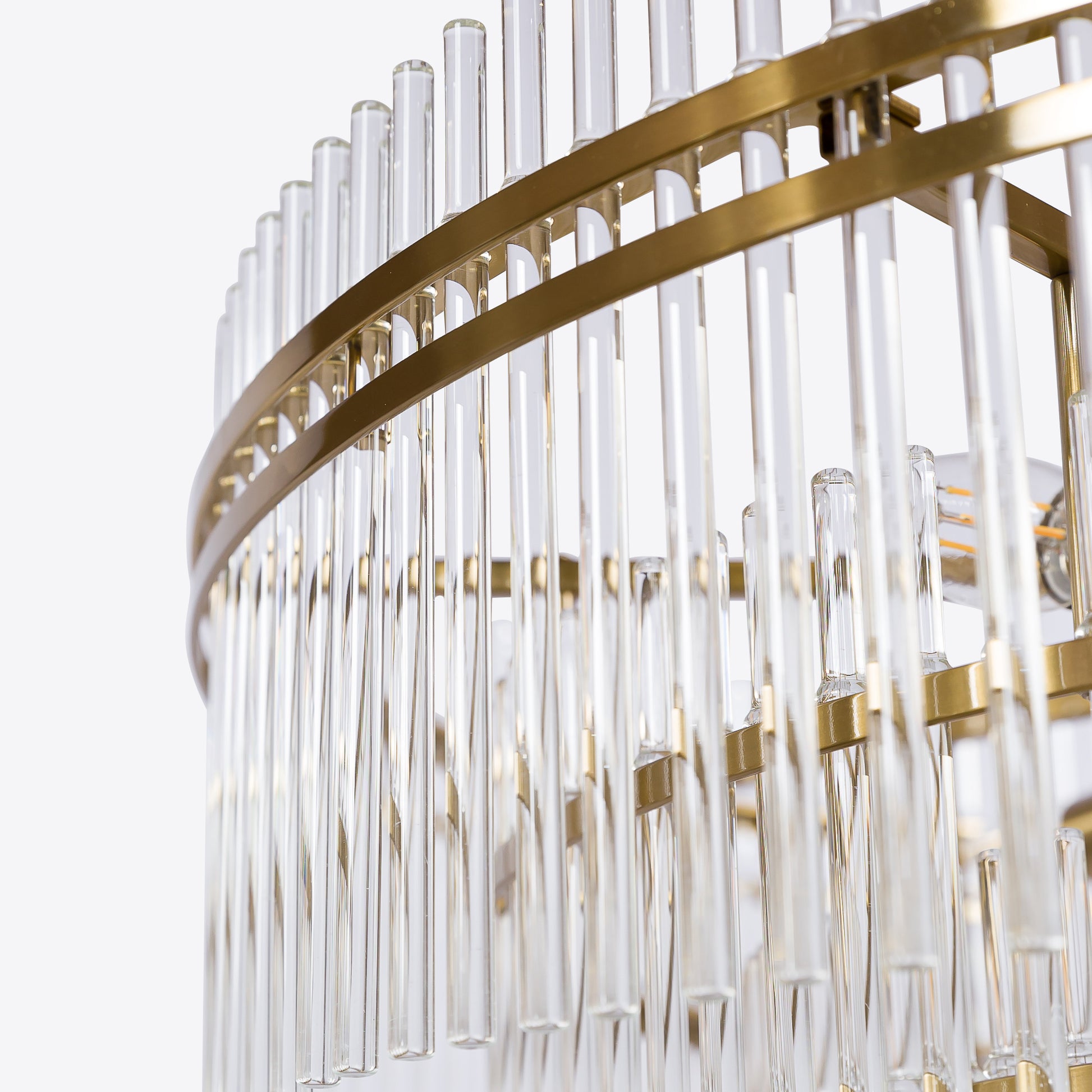 Tiered crystal glass chandelier with gold frame and chain suspension