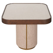 Modern wood side table with upholstered base and brass accents