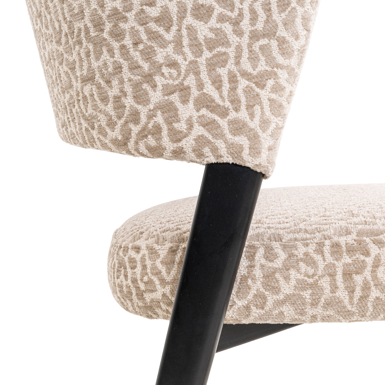 Contemporary dining chair with animal print fabric and black frame