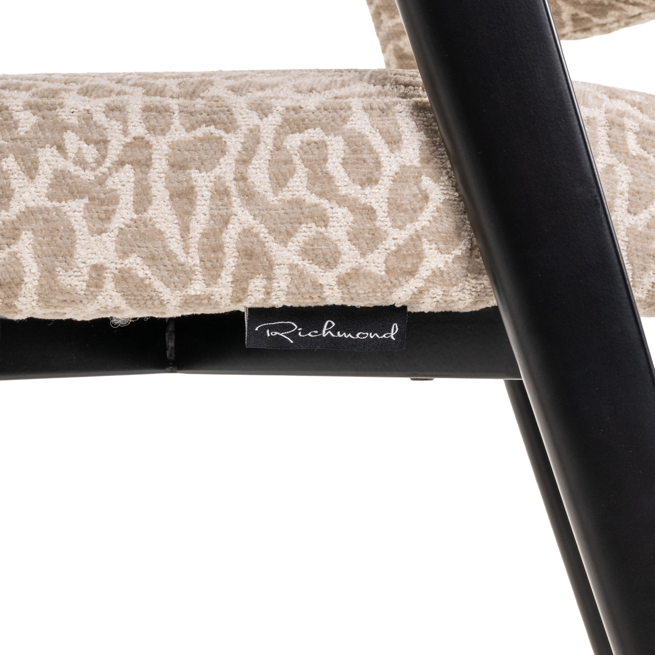 Contemporary dining chair with animal print fabric and black frame